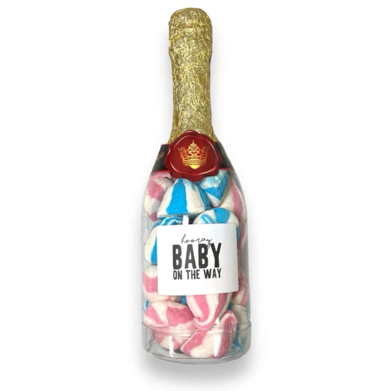 Champagne fles gevuld met geboorte spekjes