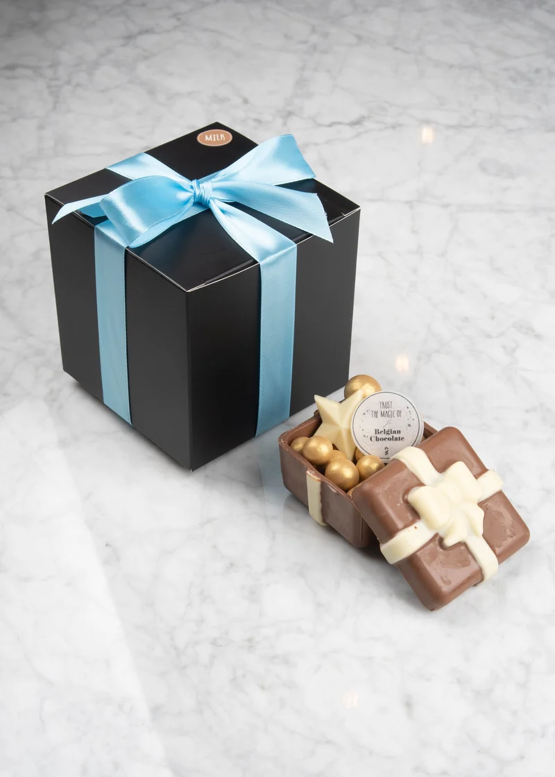 Fortune gift in melkchocolade en gevuld met Gold pearls