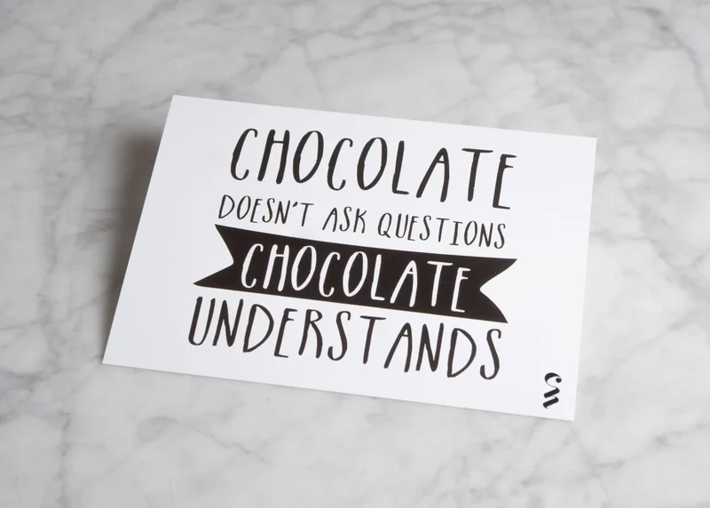 Postkaart 'Chocolate doesn't ask questions'